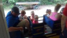 Isaiah and kids riding the train